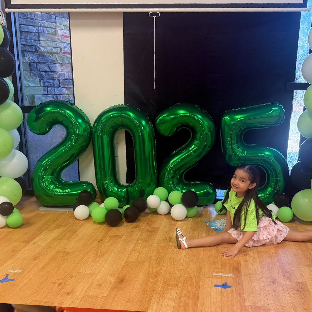 Pre-K graduation caps and performance at Curious Kids